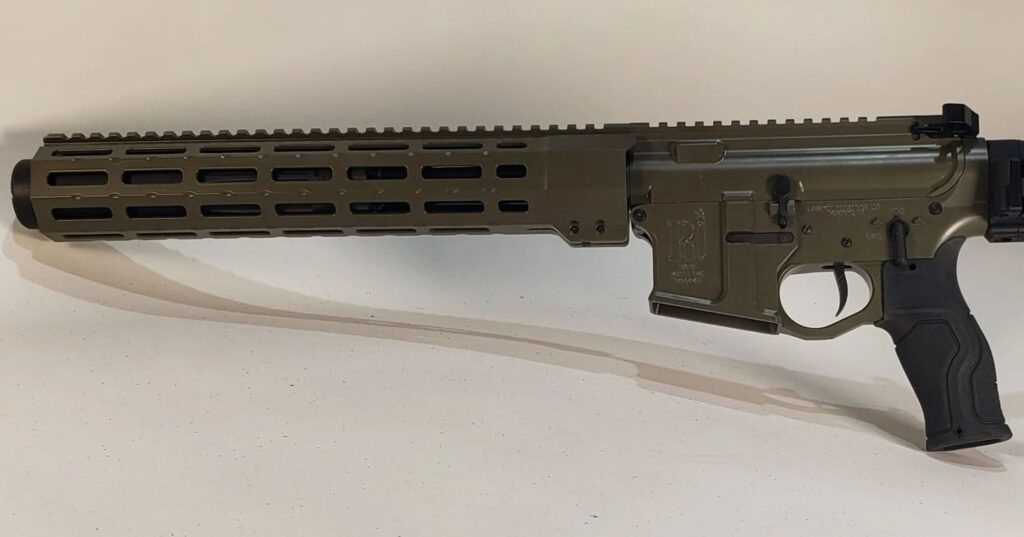 Rankin Industries rifle with permanently welded suppressor